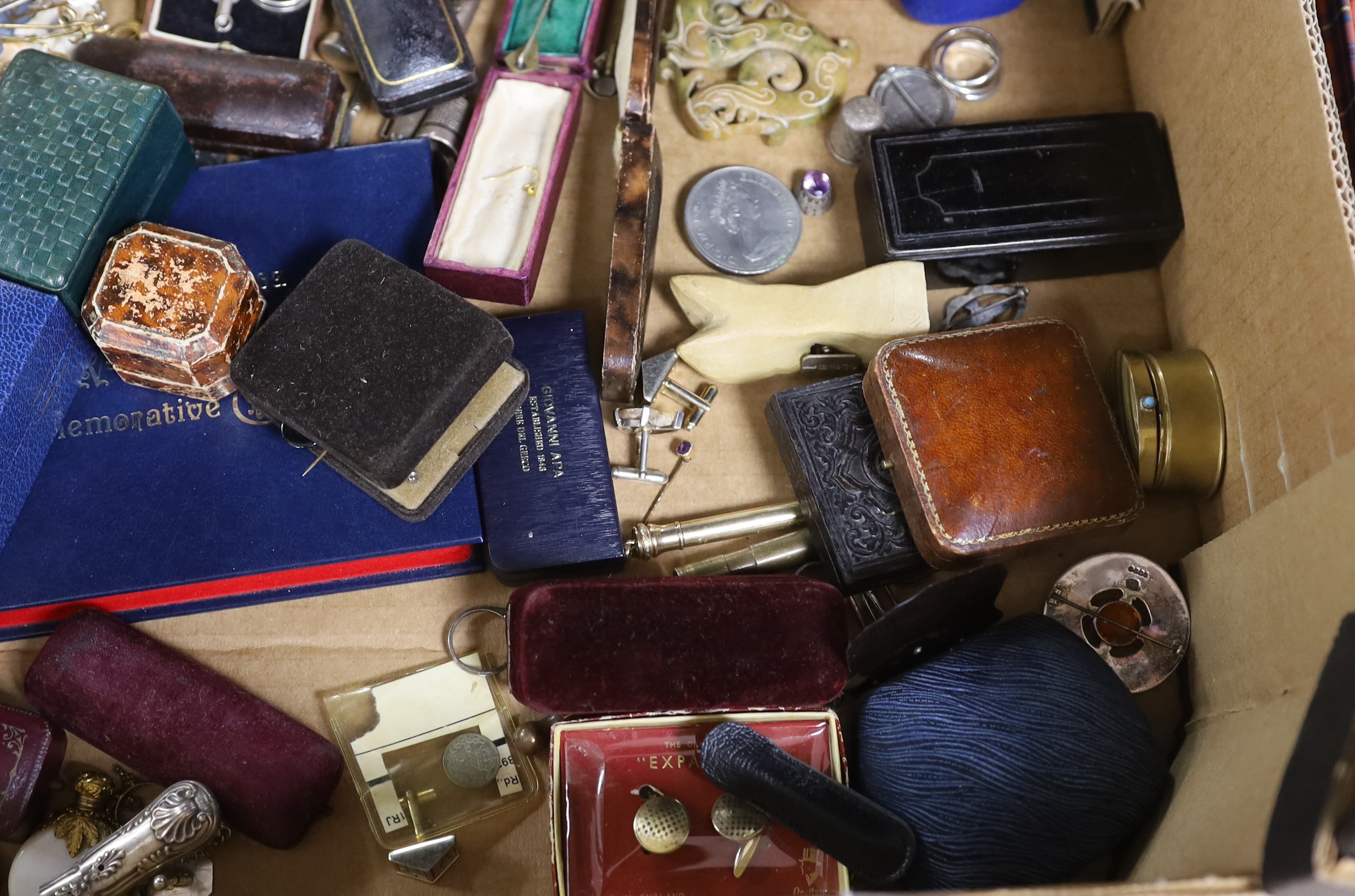 A large quantity of assorted collectables and curios including stick pins, brooches, pens, Links silver cufflinks, coins, jewellery boxes including two Cartier, rings, pendants etc.